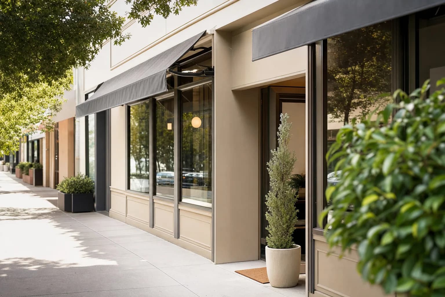 Clean, freshly painted retail storefront exterior, inviting