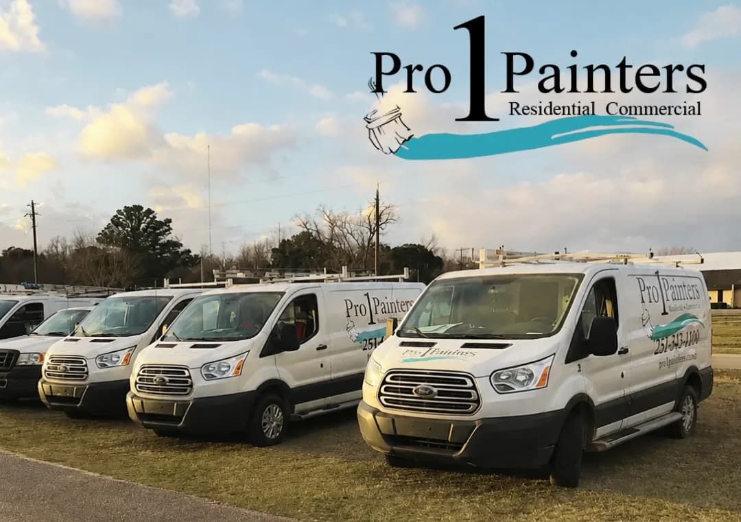 The Pro 1 Painters branded van fleet