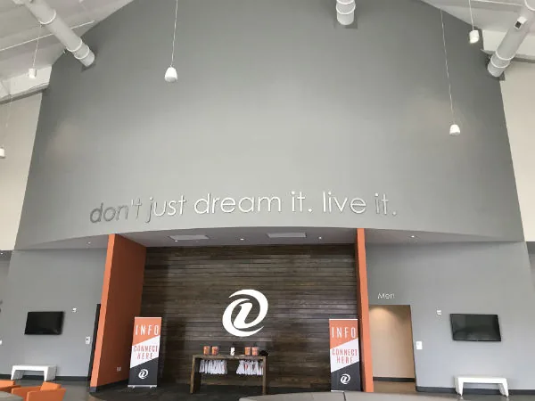 Destination Church (Saraland) in Saraland, AL — the repainted Destination Church sanctuary with its tall feature wall, painted by Pro 1 Painters