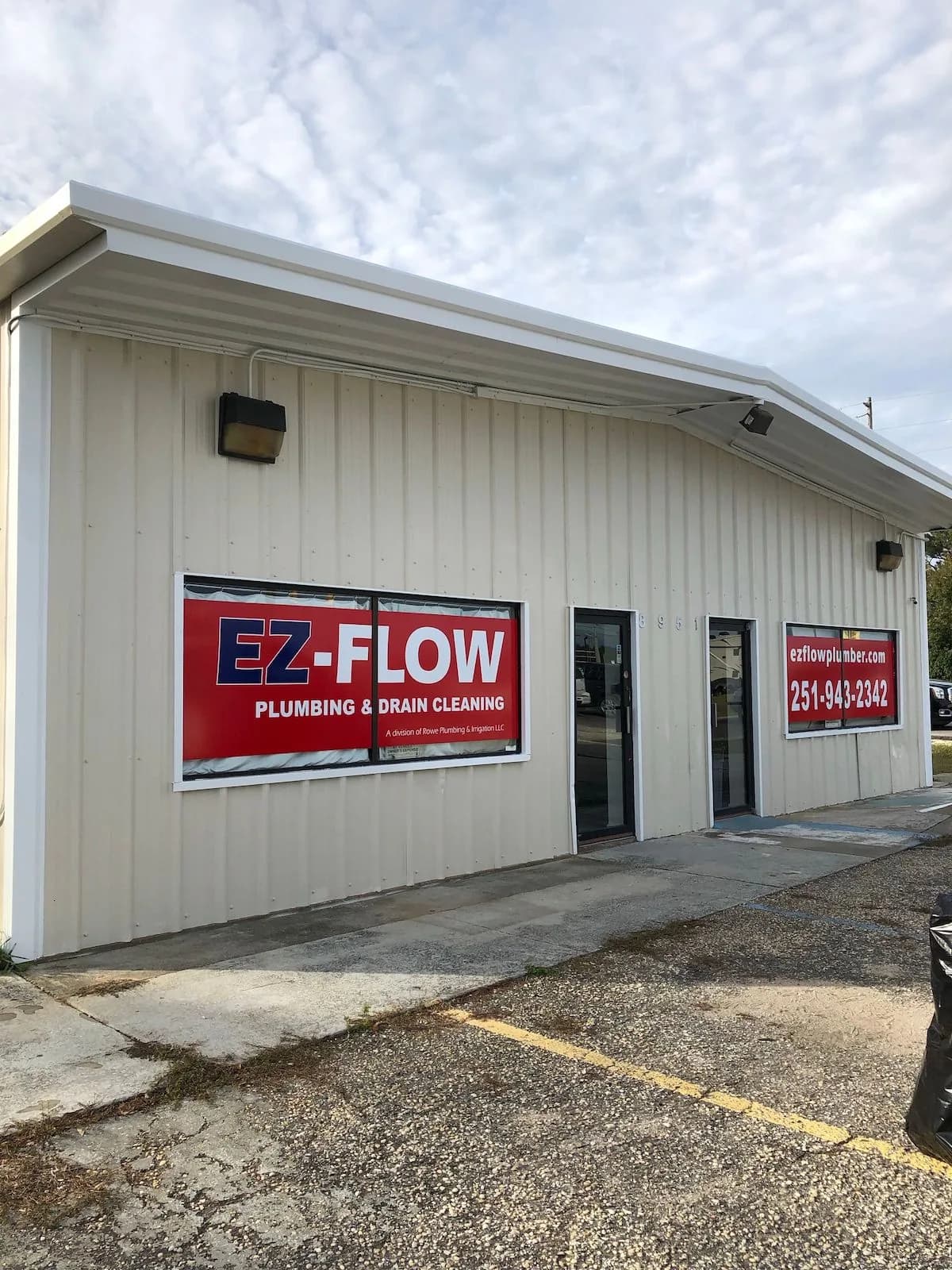 EZ Flow in Foley, AL — the finished EZ Flow building exterior with new color and signage, painted by Pro 1 Painters
