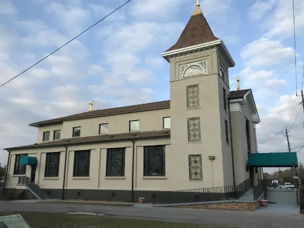 St. Margaret's Church in Bayou La Batre, AL — St. Margaret's Church with its bell tower after waterproofing and repaint, painted by Pro 1 Painters